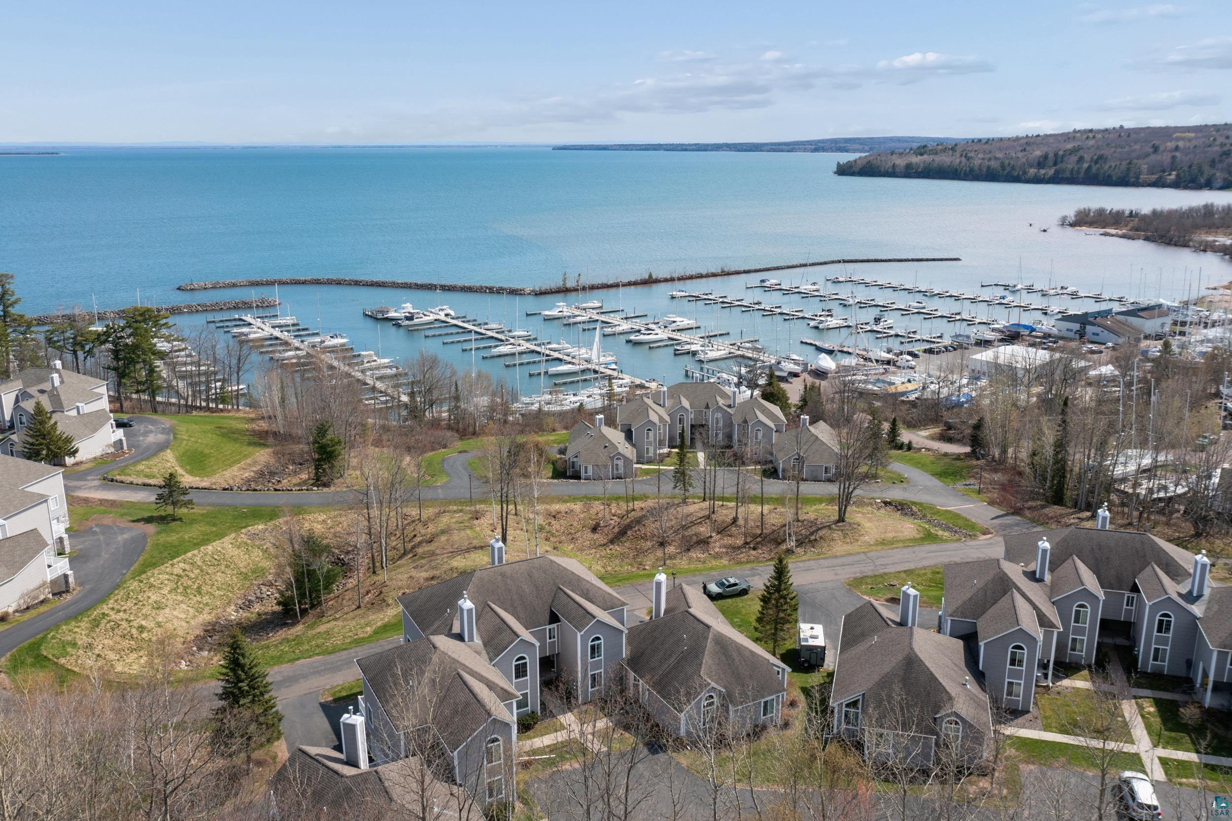 Aerial perspective showcasing marina with numerous boats