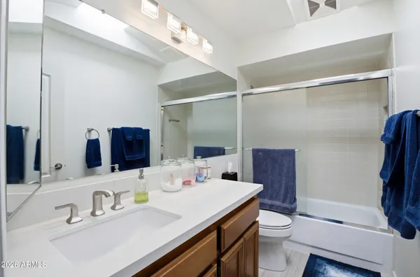 a view of hallway with washer and dryer