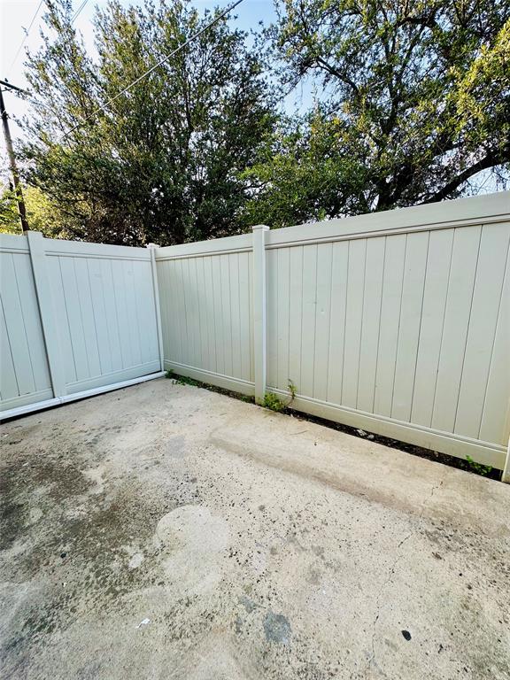 2240 Tarpley Road, Unit 234 Carrollton, TX 75006 - Photo 13 of 13 a view of a backyard