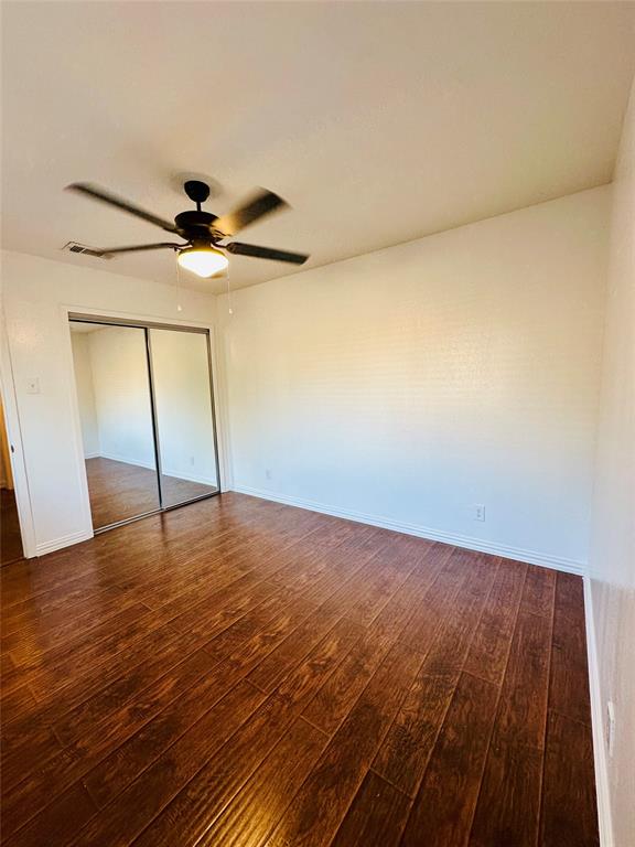 2240 Tarpley Road, Unit 234 Carrollton, TX 75006 - Photo 4 of 13 wooden floor in an empty room