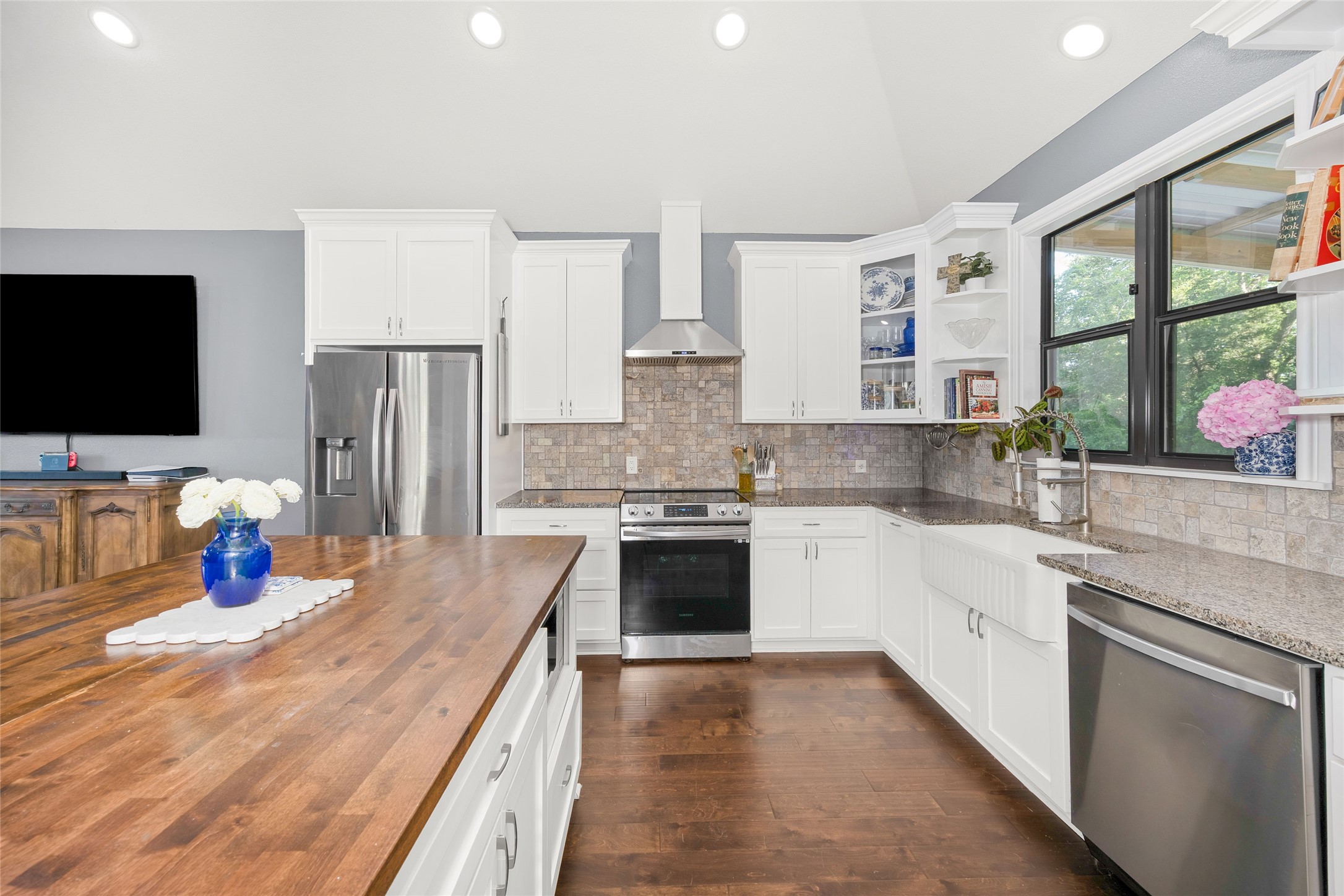 2021 Strangmeier Road Brenham, TX 77833 - Photo 8 of 16 These granite countertops, stylish backsplash, and stainless steel appliances create a space that any chef would be proud to work in.