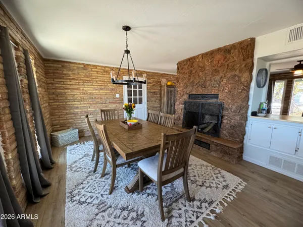 a view of a dining room with furniture