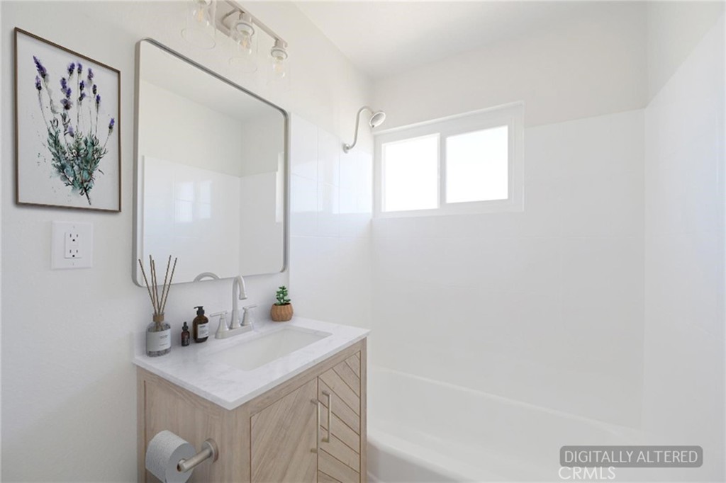 18190 Hiawatha Road Apple Valley, CA 92307 - Photo 19 of 28 Guest Bathroom (Disclaimer: Some images have been digitally enhanced with virtual staging to illustrate potential room layouts and furnishings. Actual property condition and features may vary. Buyer to verify all information independently).