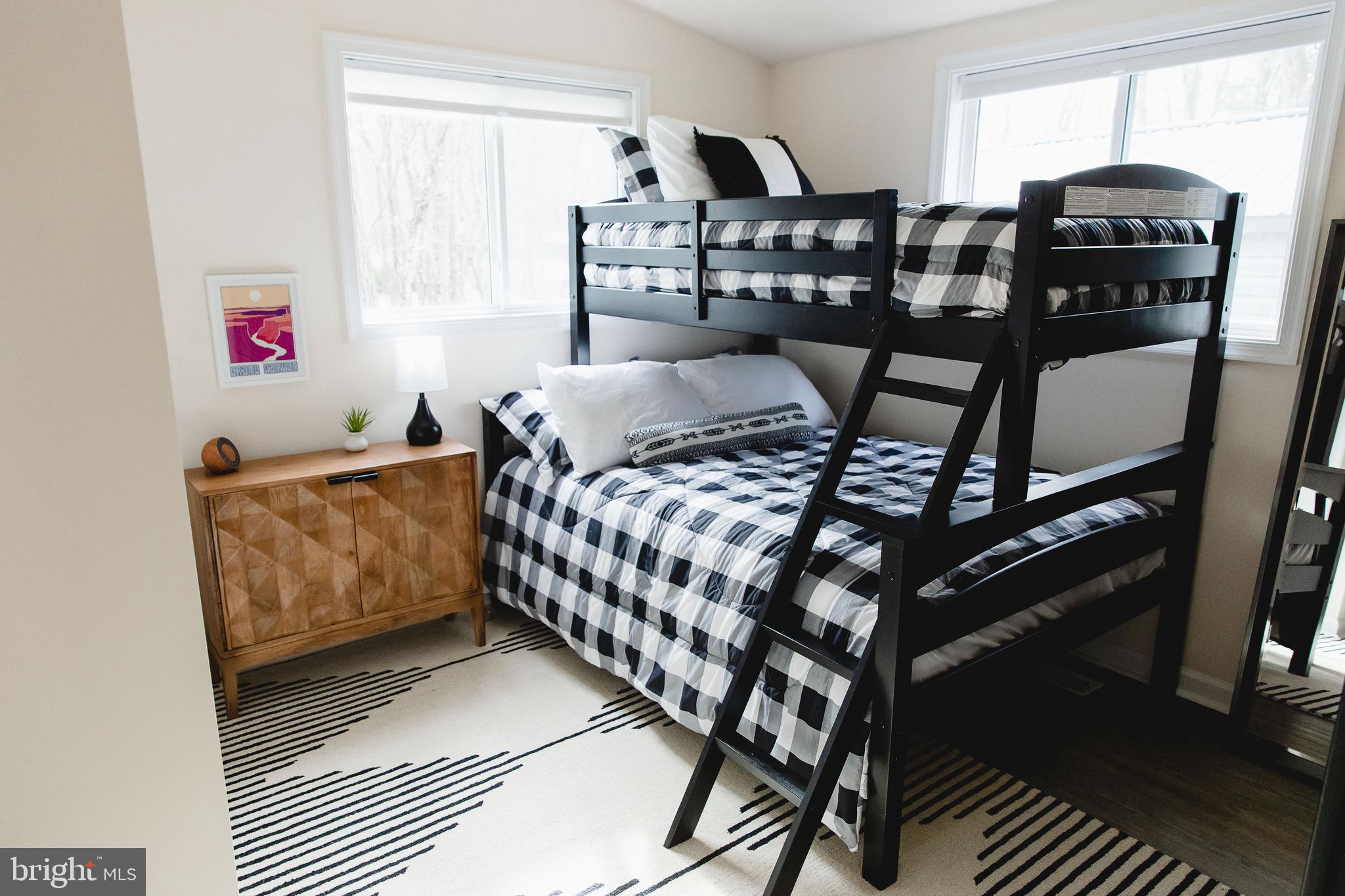 331 Walden Road Hedgesville, WV 25427 - Photo 21 of 30 a bedroom with a bed and window