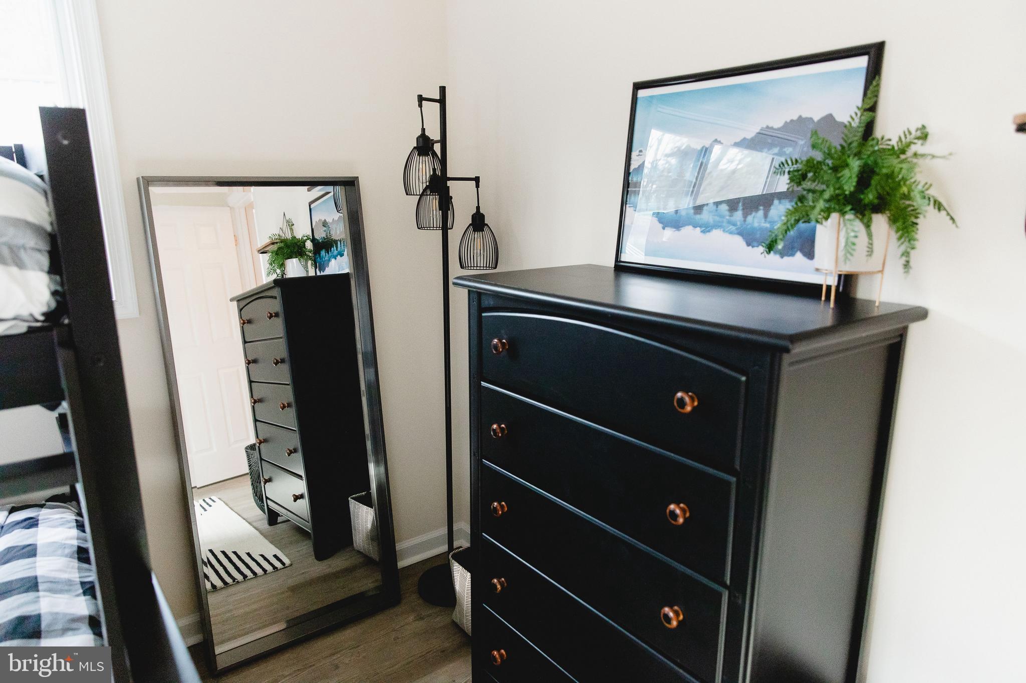 331 Walden Road Hedgesville, WV 25427 - Photo 22 of 30 a living room with furniture and a flat screen tv
