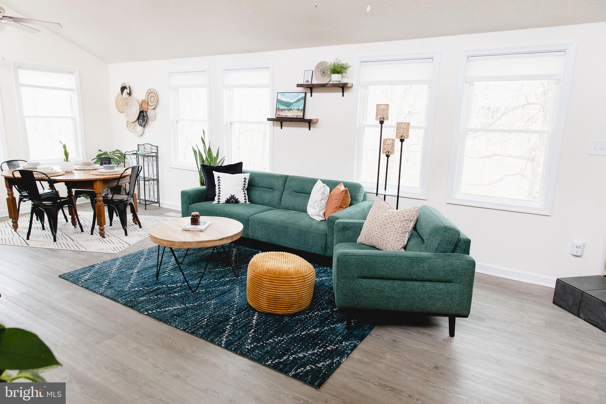 331 Walden Road Hedgesville, WV 25427 - Photo 3 of 30 a living room with furniture a rug and a window