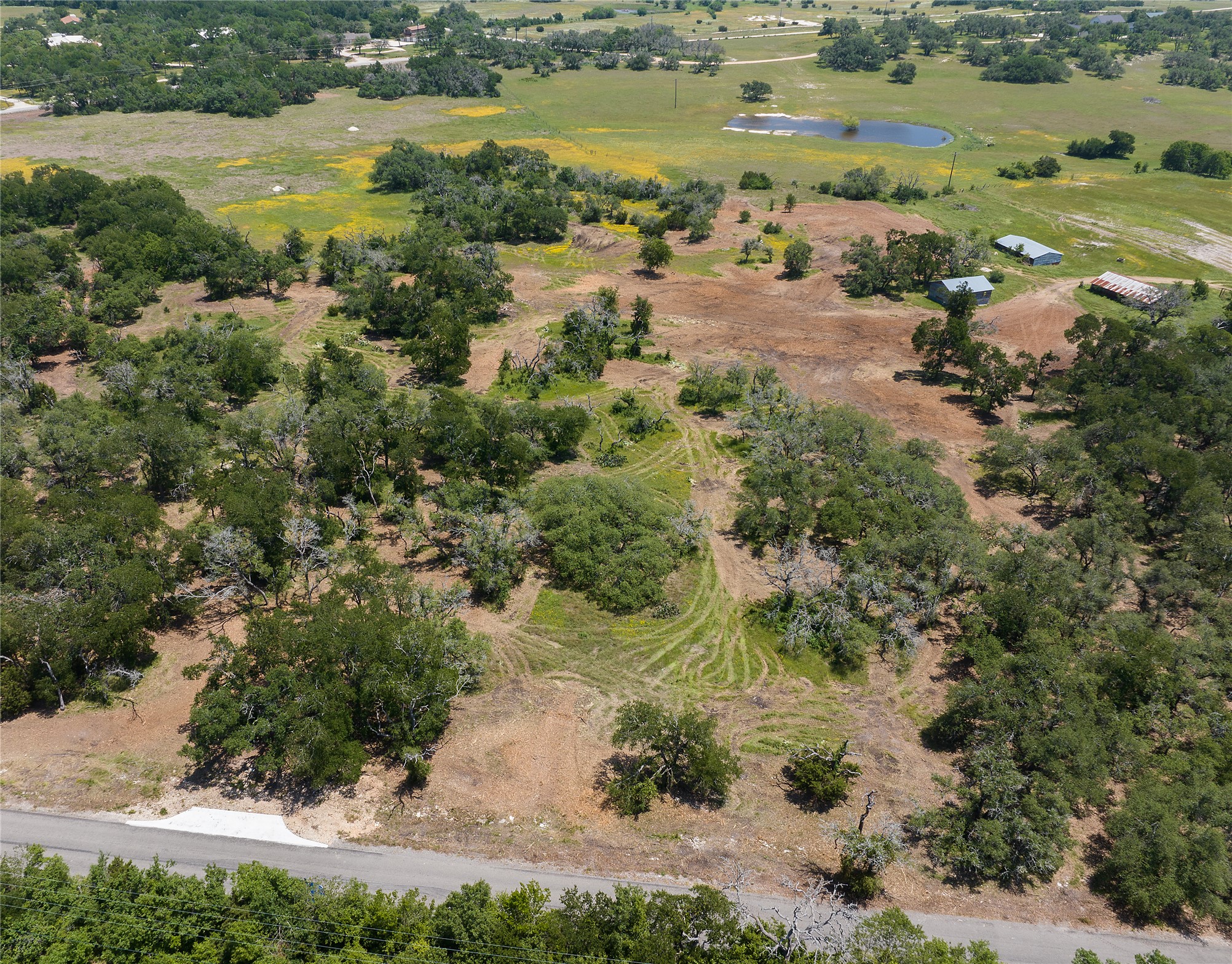1460 County Road 153 Georgetown, TX 78626 - Photo 3 of 5 a view of a lake with outdoor space