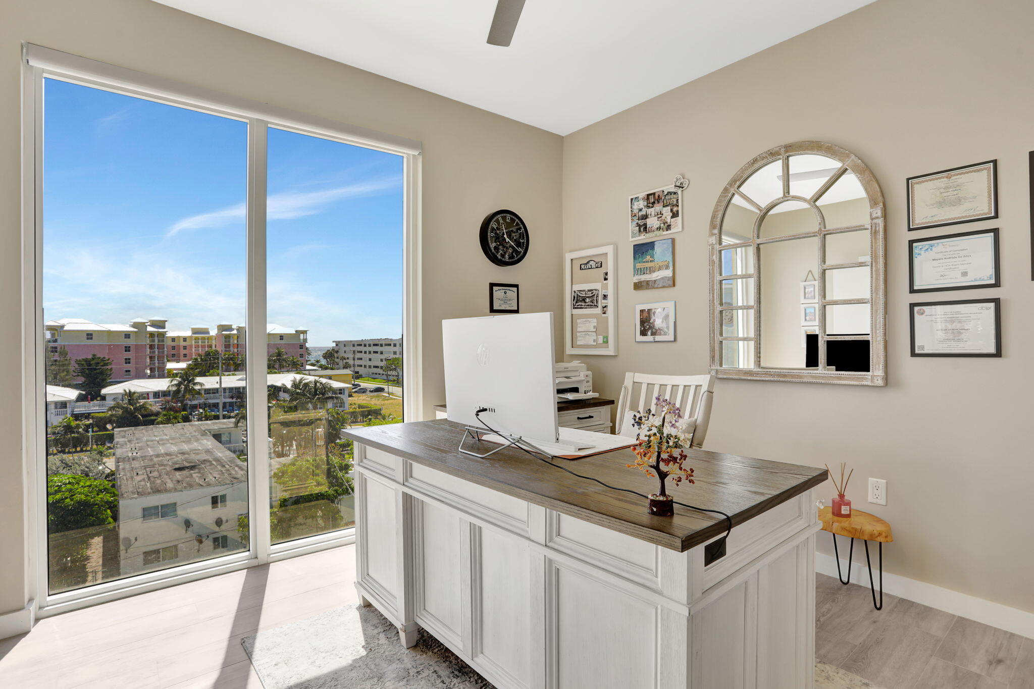 1900 Southeast 2nd Street, Unit 501 Deerfield Beach, FL 33441 - Photo 17 of 41 a view of a kitchen with living room and microwave