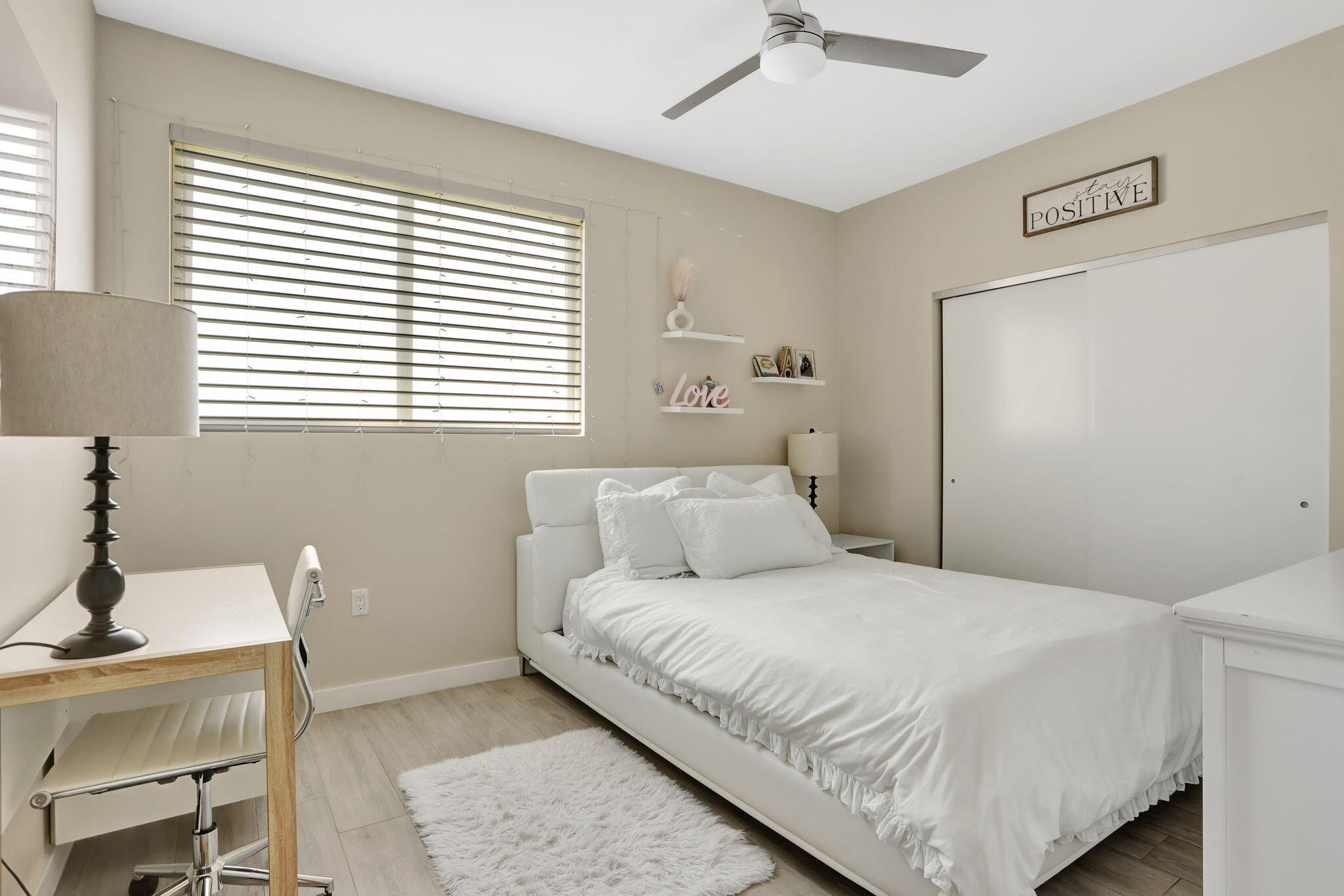 1900 Southeast 2nd Street, Unit 501 Deerfield Beach, FL 33441 - Photo 25 of 41 a bedroom with a bed and a table