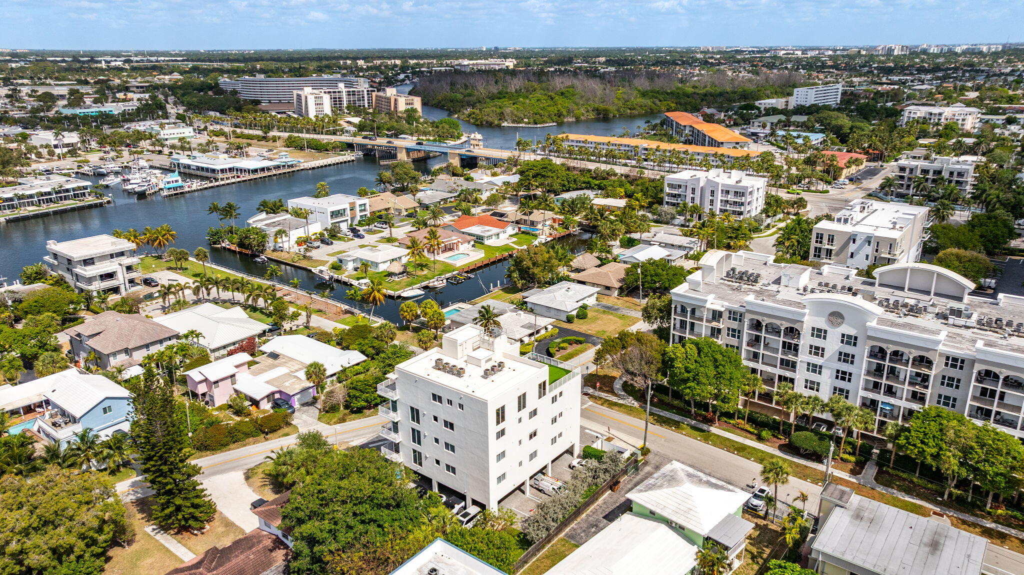 1900 Southeast 2nd Street, Unit 501 Deerfield Beach, FL 33441 - Photo 33 of 41 an aerial view of residential building and lake