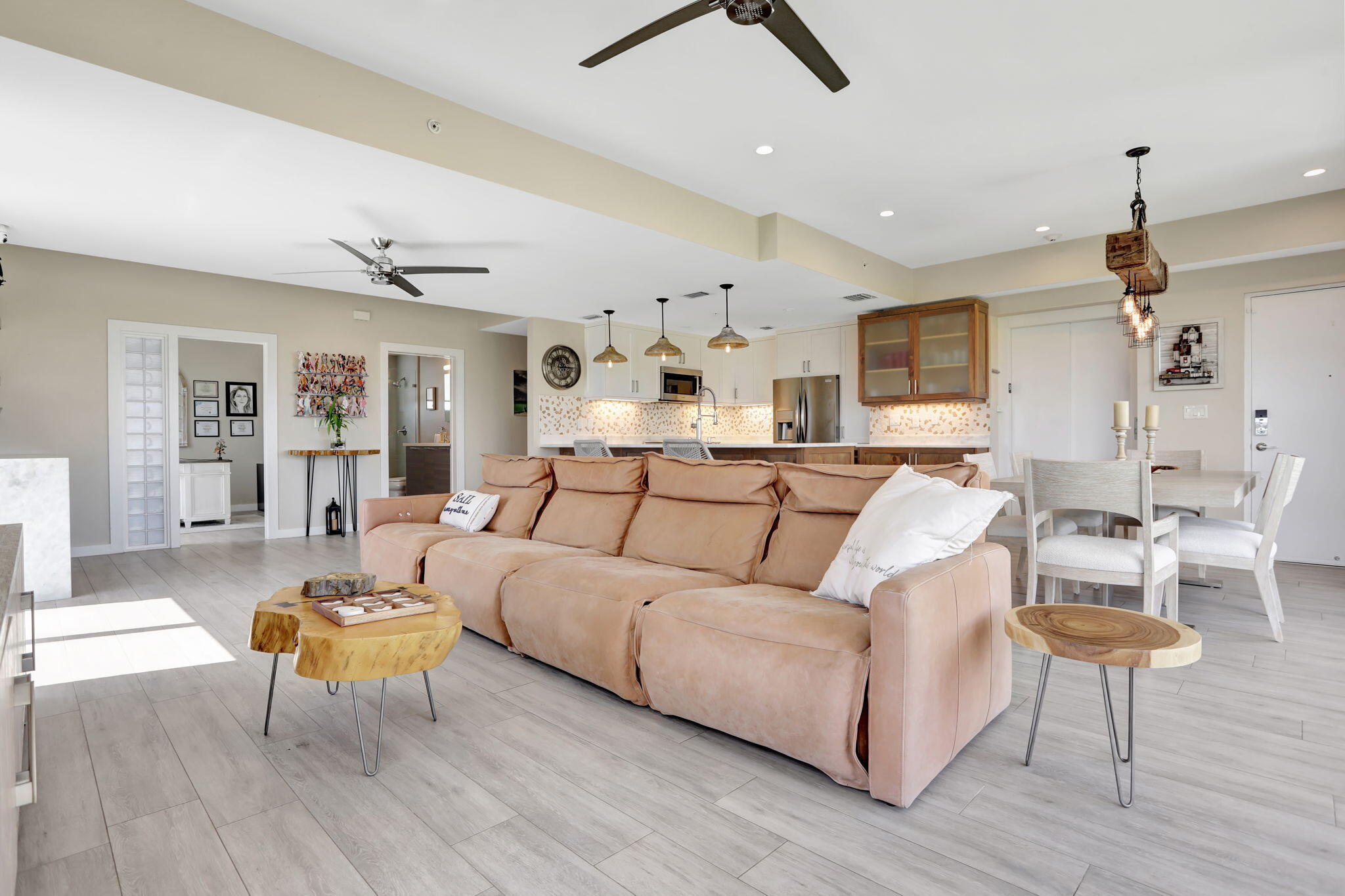 1900 Southeast 2nd Street, Unit 501 Deerfield Beach, FL 33441 - Photo 5 of 41 a living room with furniture and a wooden floor