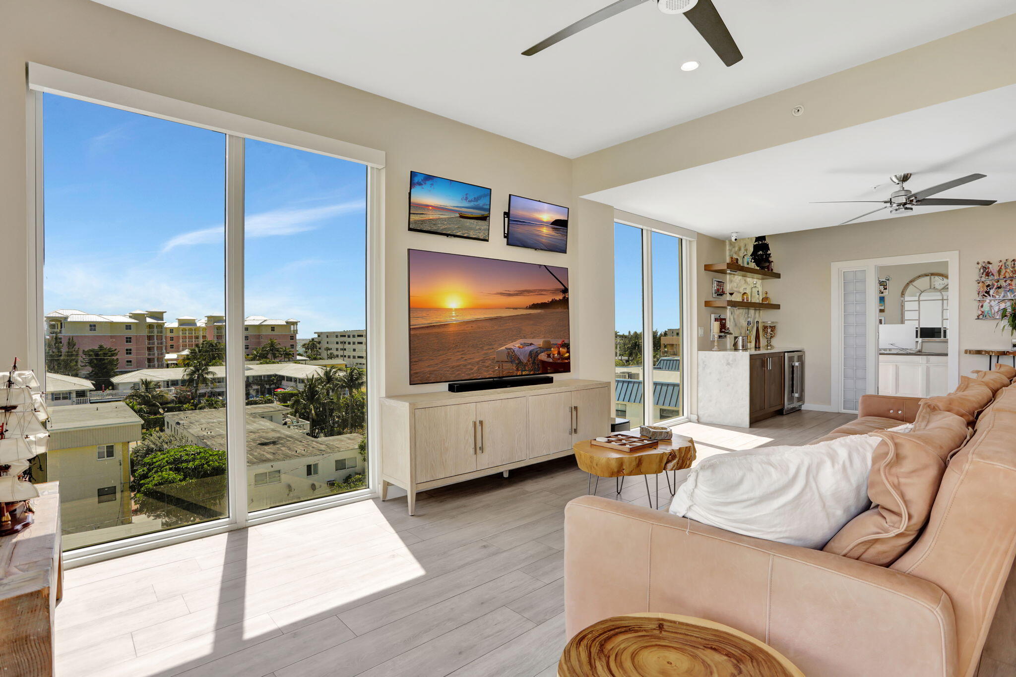 1900 Southeast 2nd Street, Unit 501 Deerfield Beach, FL 33441 - Photo 6 of 41 a living room with furniture and a flat screen tv