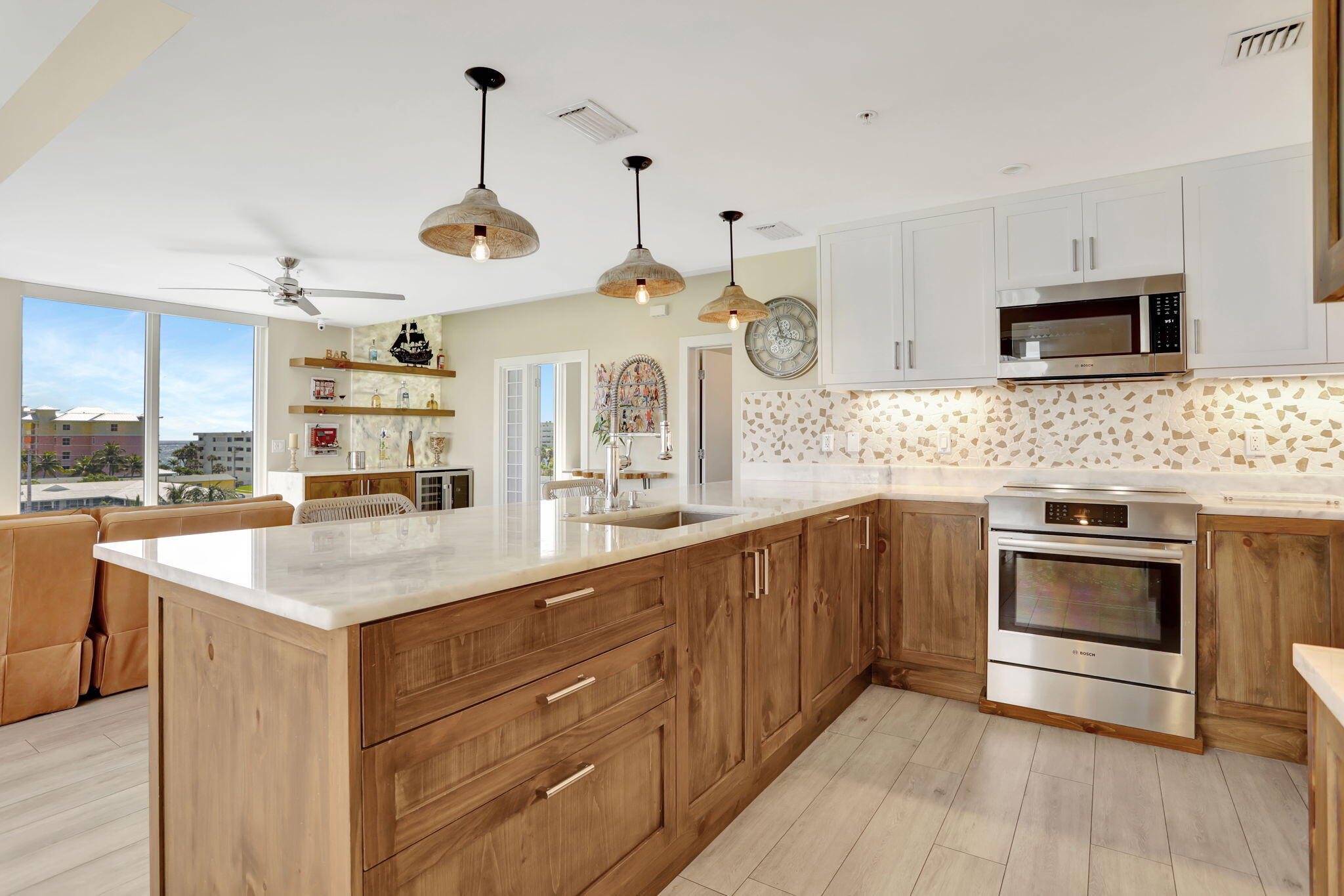 1900 Southeast 2nd Street, Unit 501 Deerfield Beach, FL 33441 - Photo 10 of 41 a kitchen with stainless steel appliances granite countertop a stove and cabinets