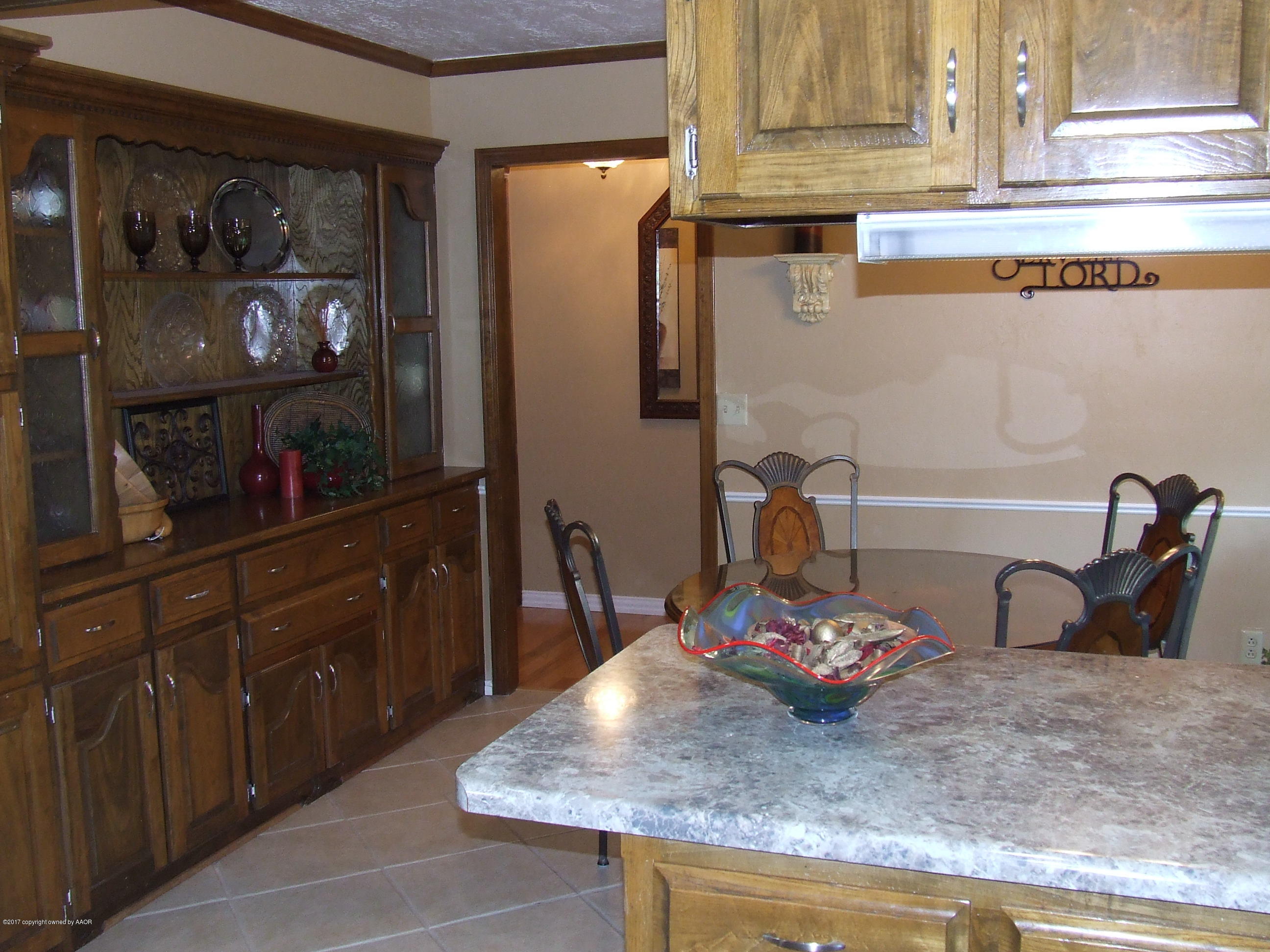 5100 While A Way Road Amarillo, TX 79109 - Photo 8 of 25 Kitchen to Dining