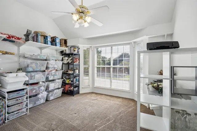 a living room with lots of furniture and a chandelier