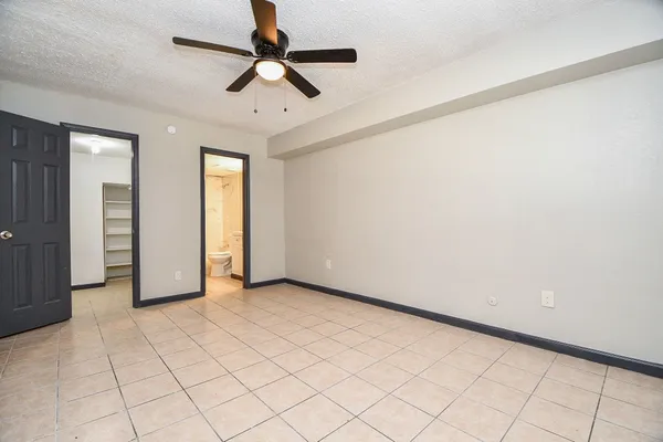 en empty room with windows