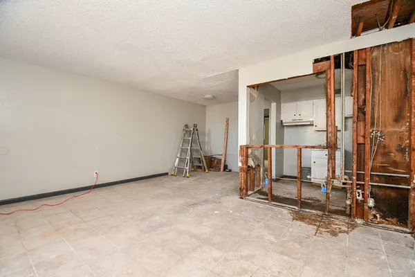 an empty room with windows