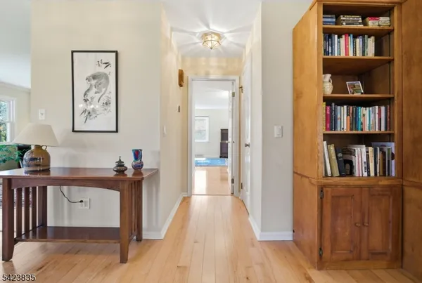 a spacious bedroom with a bed and a table