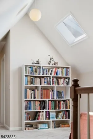 a spacious bedroom with a bed and a table