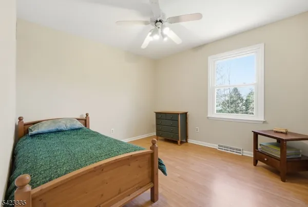 a view of a workspace with furniture