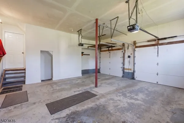 a view of balcony with wooden floor and fence
