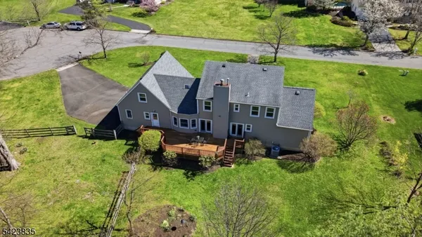 an aerial view of residential house with outdoor space