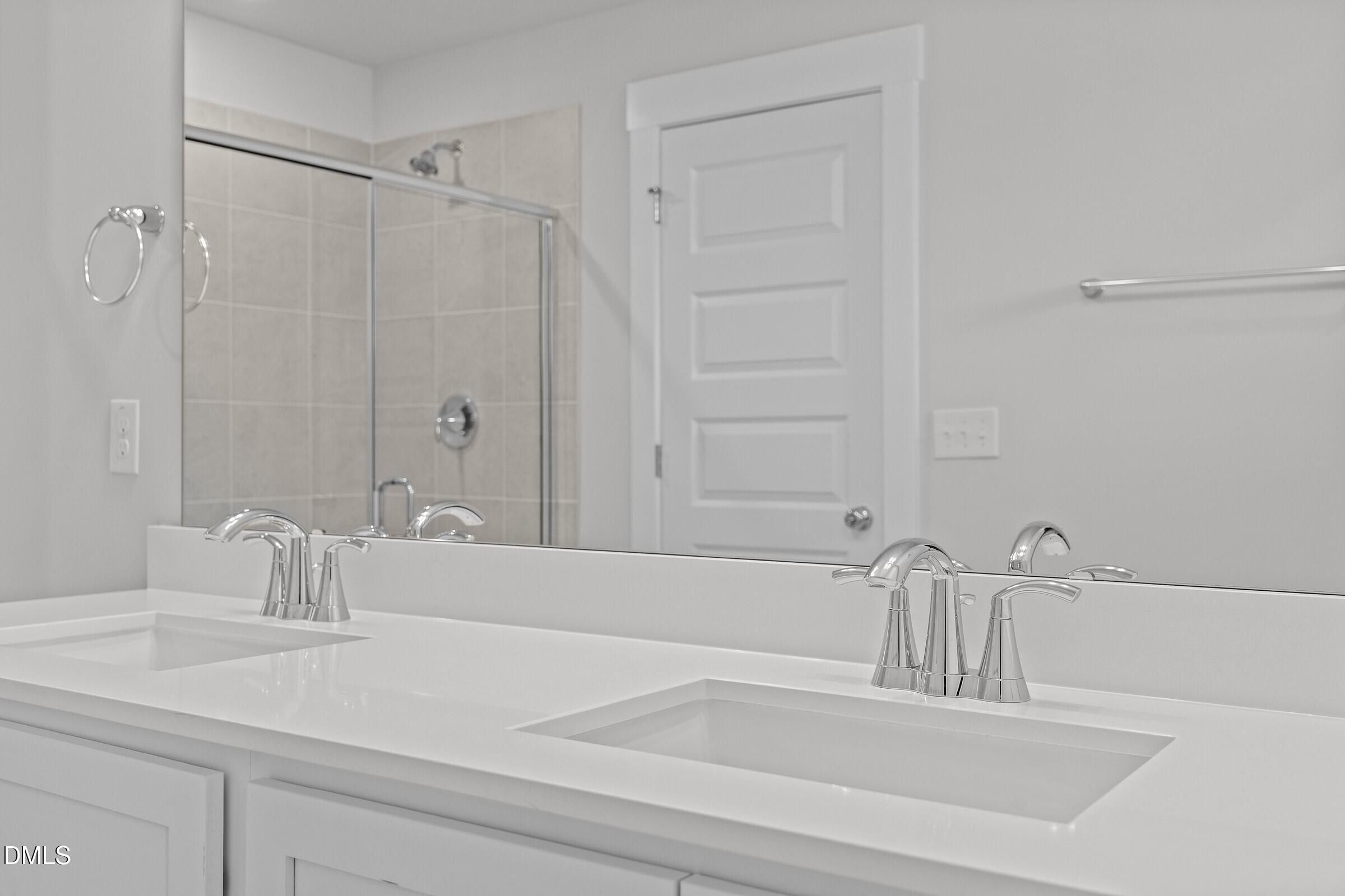 2916 Alyssa Court Raleigh, NC 27604 - Photo 14 of 21 Primary Bathroom - Classic White Button