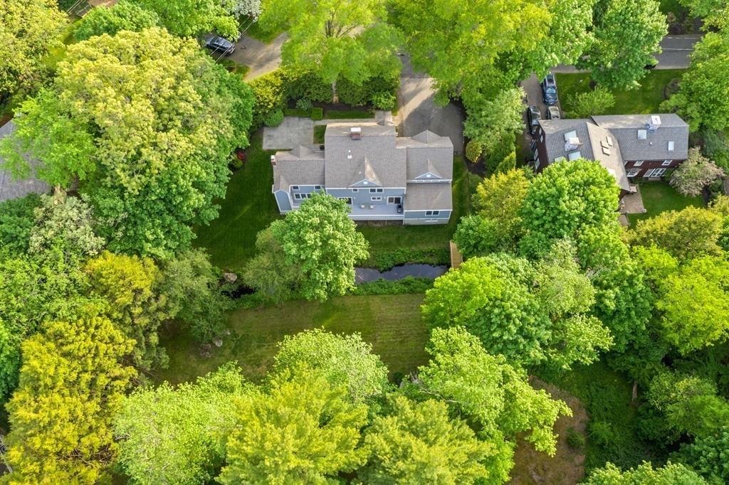 22 Wilde Road Wellesley, MA 02481 - Photo 5 of 23 an aerial view of a house with a yard