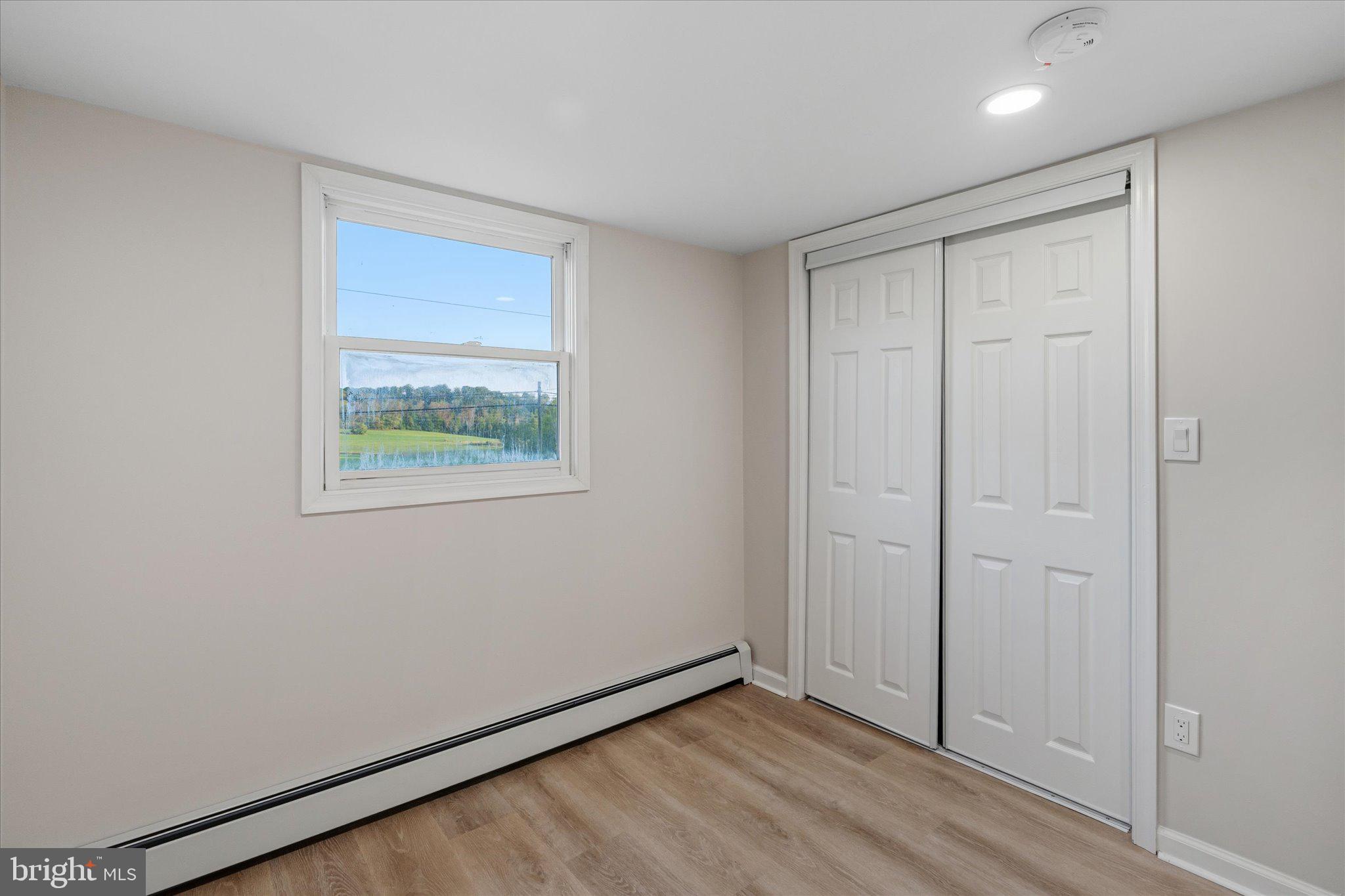 831 Deturksville Road Pine Grove, PA 17963 - Photo 18 of 24 a view of an empty room with closet and a window