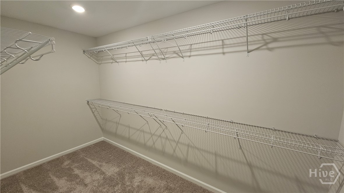 109 Classic Drive Pooler, GA 31322 - Photo 12 of 28 Primary Bedroom Closet