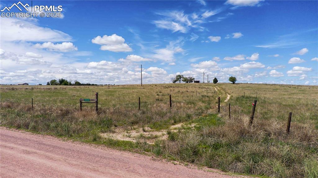 39320 Truckton Road Rush, CO 80833 - Photo 12 of 27 a view of a lake with a yard in back