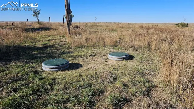 a view of a backyard of the house