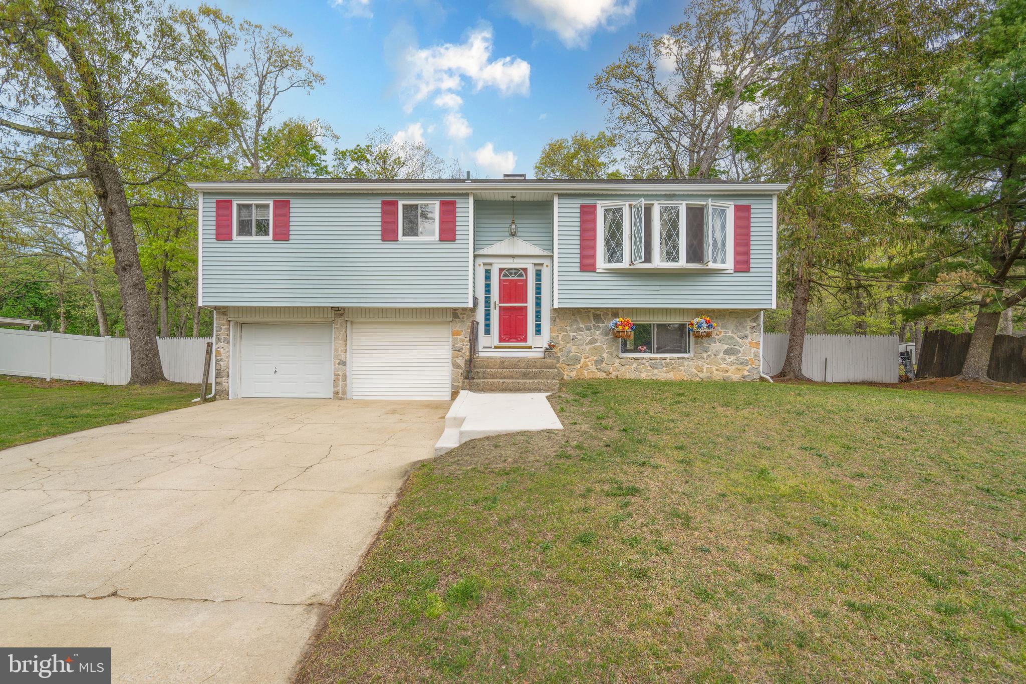 7 Briarcliff Road Atco, NJ 08004 - Photo 1 of 37 a house view with a garden space