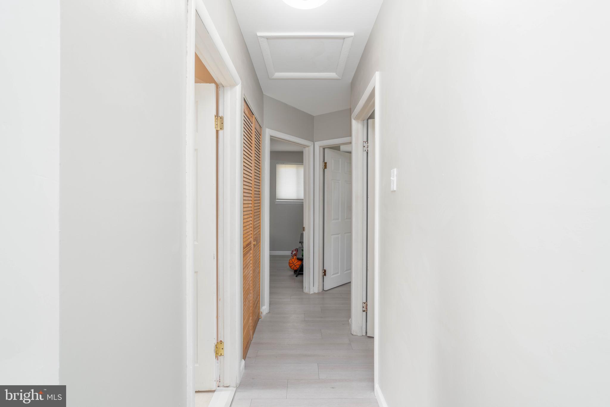 7 Briarcliff Road Atco, NJ 08004 - Photo 11 of 37 a view of a hallway with wooden shelves
