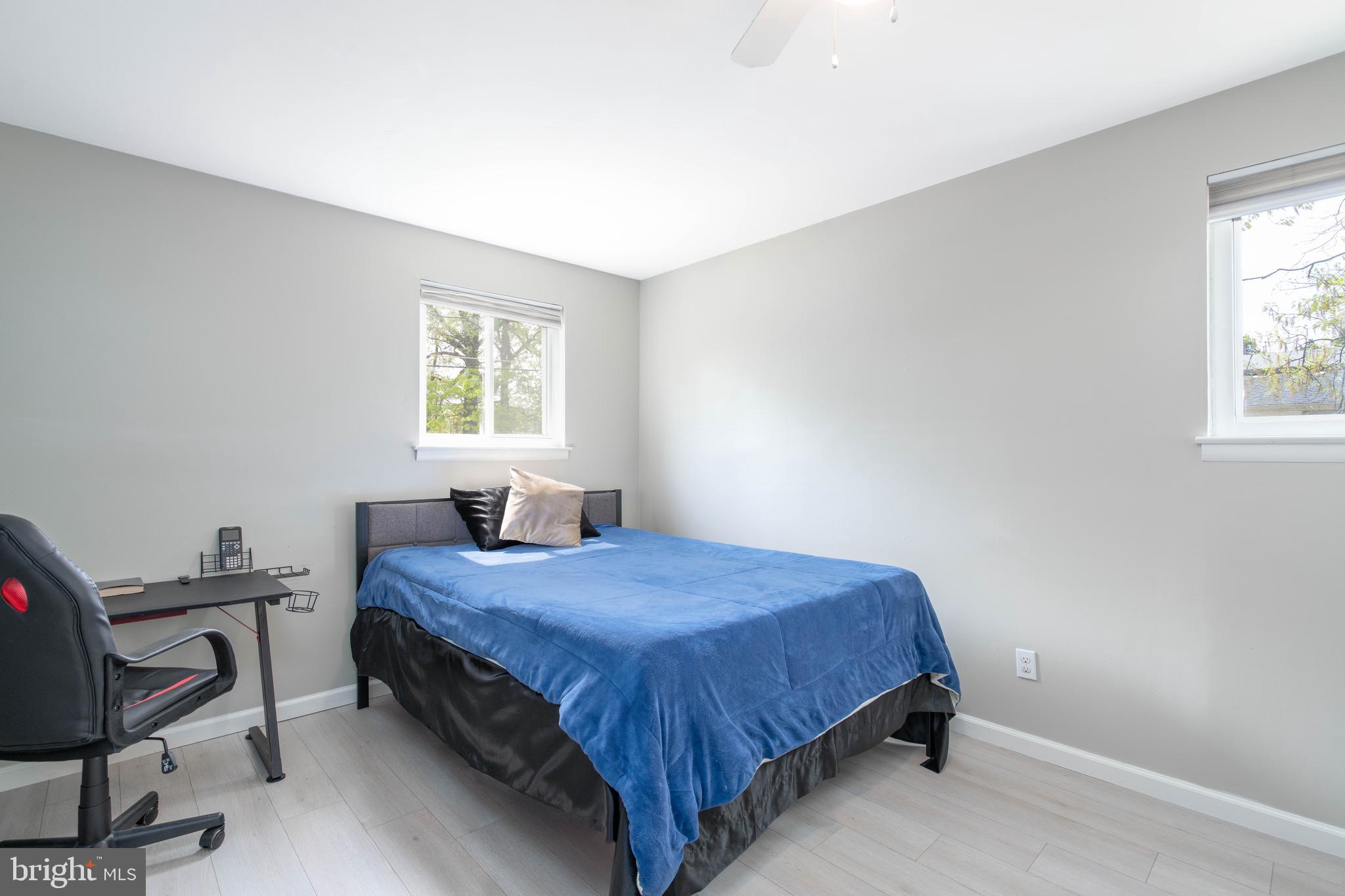 7 Briarcliff Road Atco, NJ 08004 - Photo 12 of 37 a bedroom with a bed a chair and next to a window