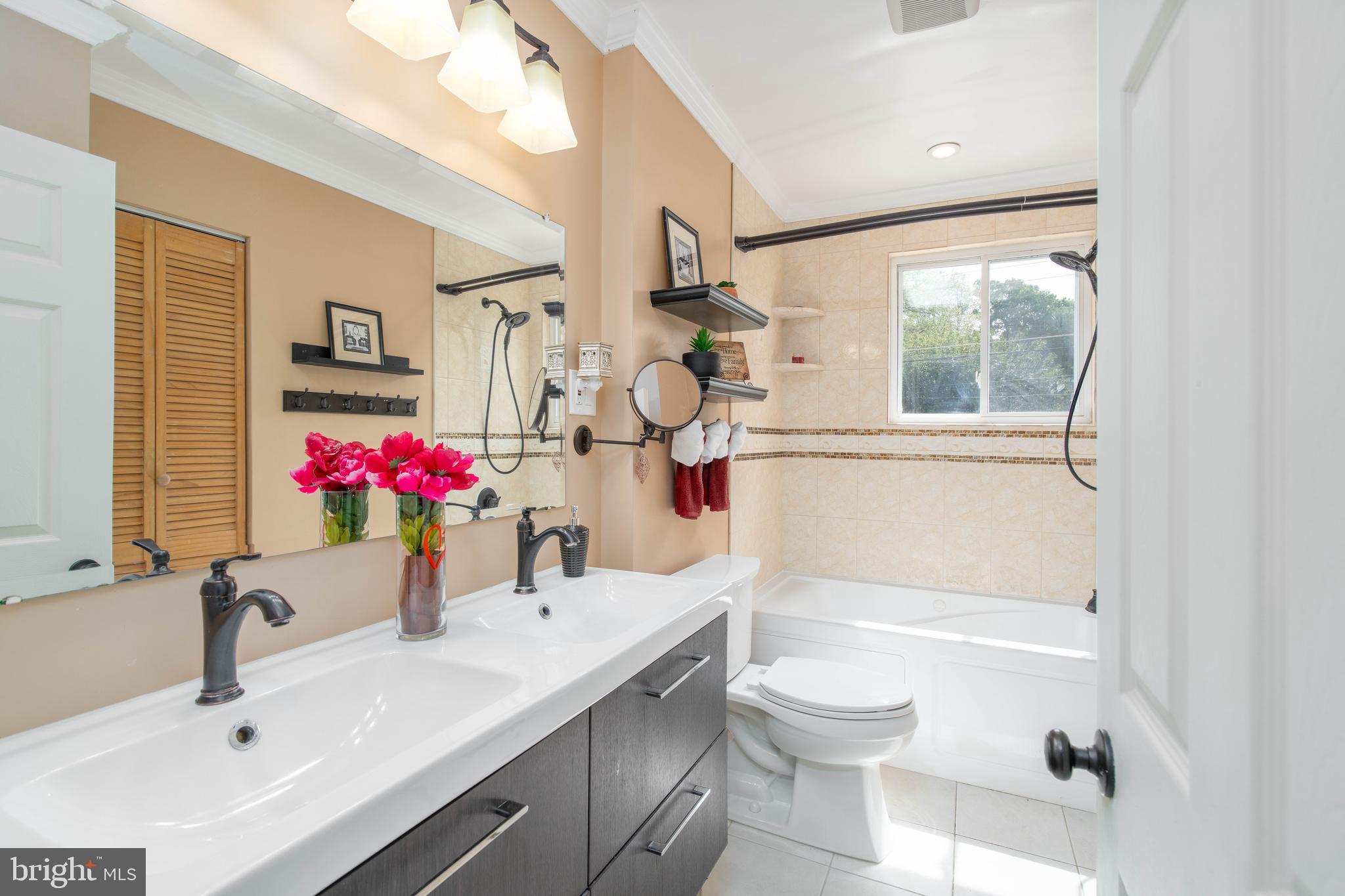 7 Briarcliff Road Atco, NJ 08004 - Photo 19 of 37 a bathroom with a sink vanity mirror and toilet