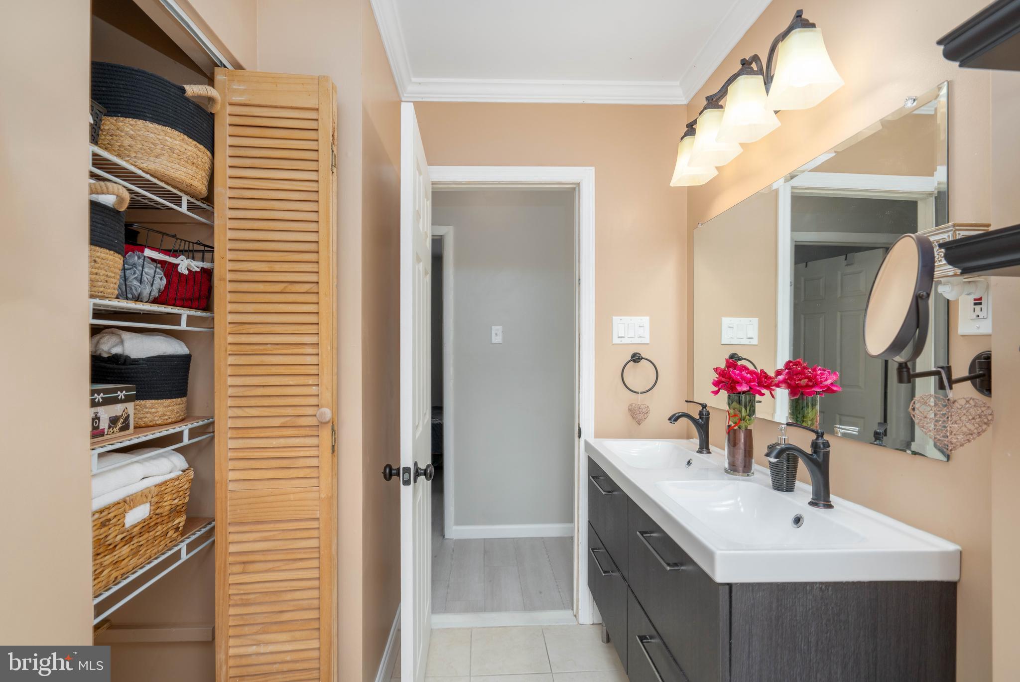 7 Briarcliff Road Atco, NJ 08004 - Photo 20 of 37 a bathroom with a sink vanity and a mirror