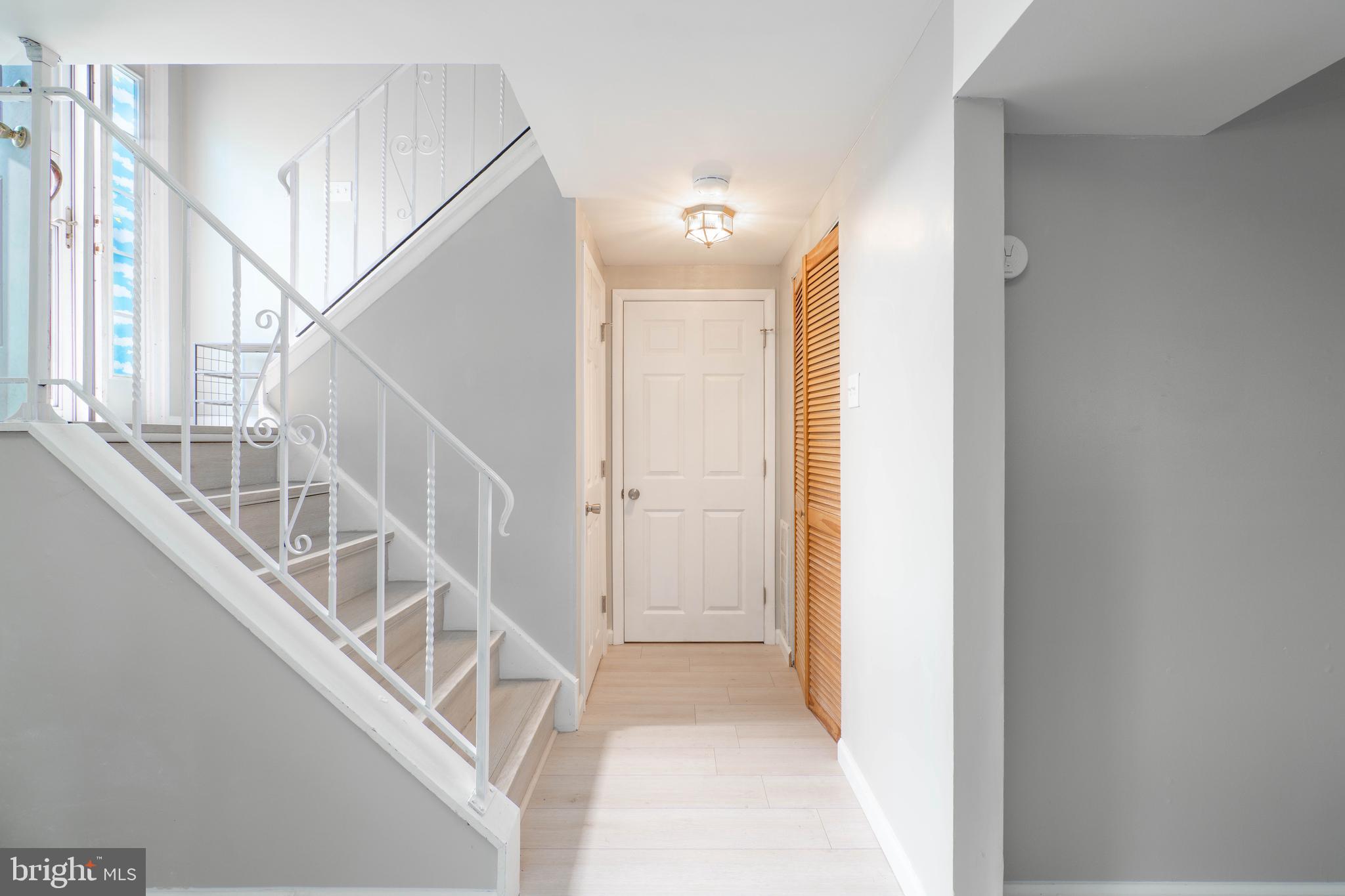 7 Briarcliff Road Atco, NJ 08004 - Photo 21 of 37 a view of entryway with wooden floor and front door