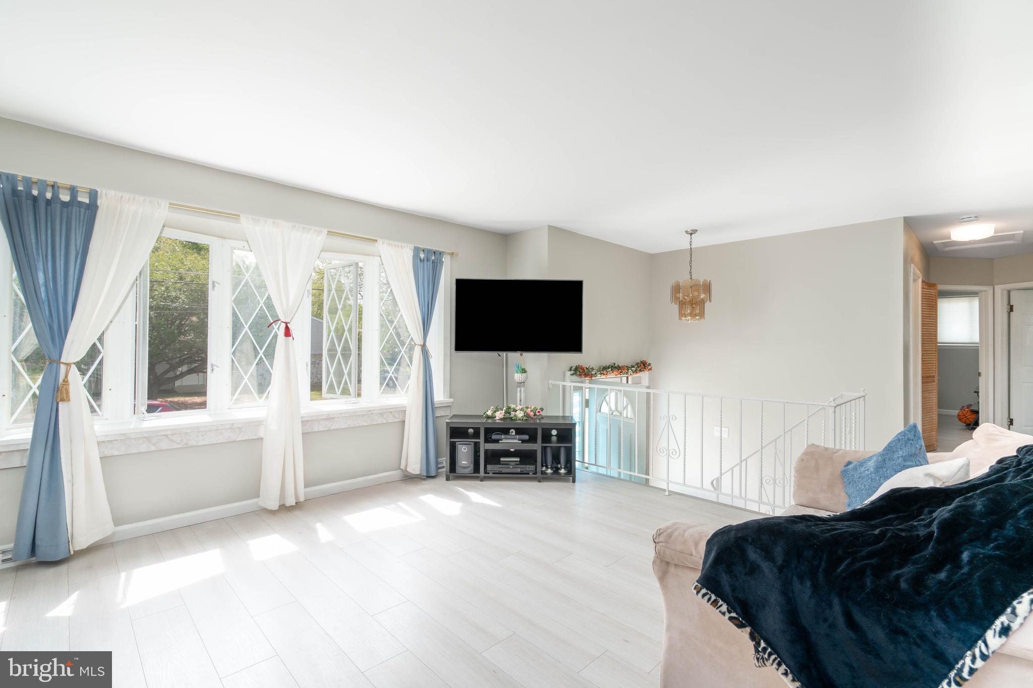 7 Briarcliff Road Atco, NJ 08004 - Photo 3 of 37 a living room with furniture and a flat screen tv