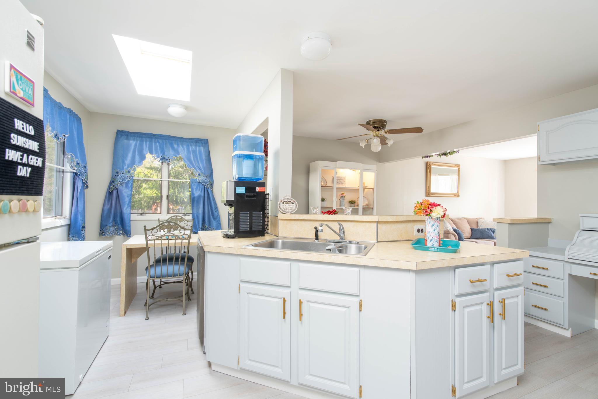 7 Briarcliff Road Atco, NJ 08004 - Photo 6 of 37 a kitchen that has a sink and a stove in it