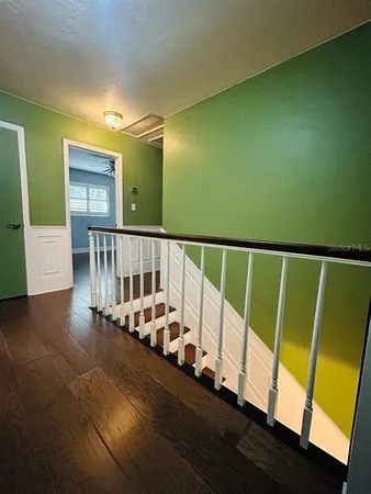 a view of deck with furniture and window