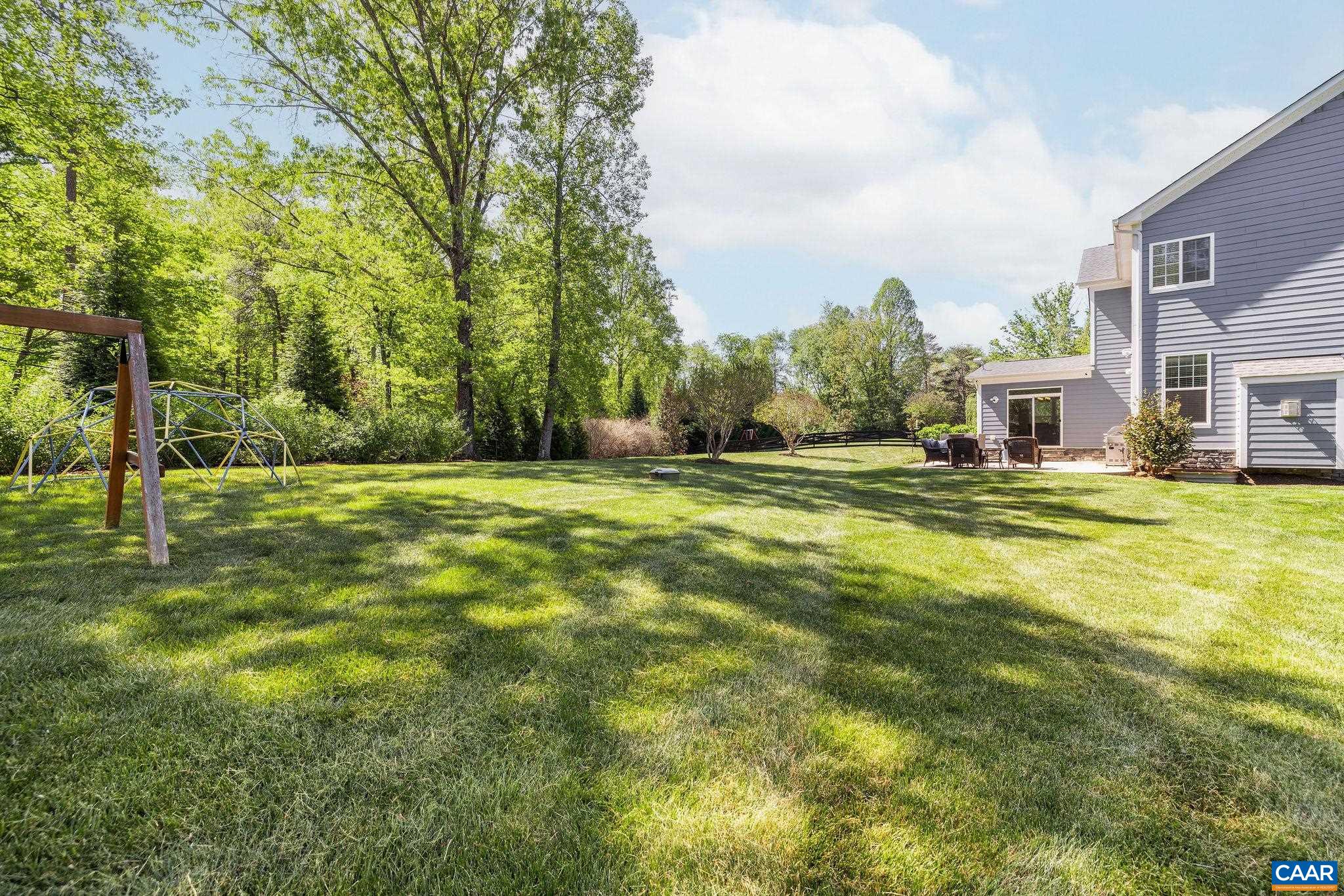 1630 Victor Place Charlottesville, VA 22903 - Photo 71 of 73 a swimming pool view with trees in the background
