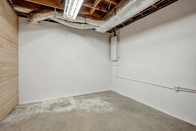 a backyard of a house with yard and outdoor seating