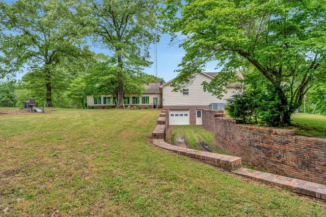 a view of a kitchen counter top and dining room