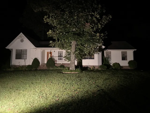 a house view with a garden space