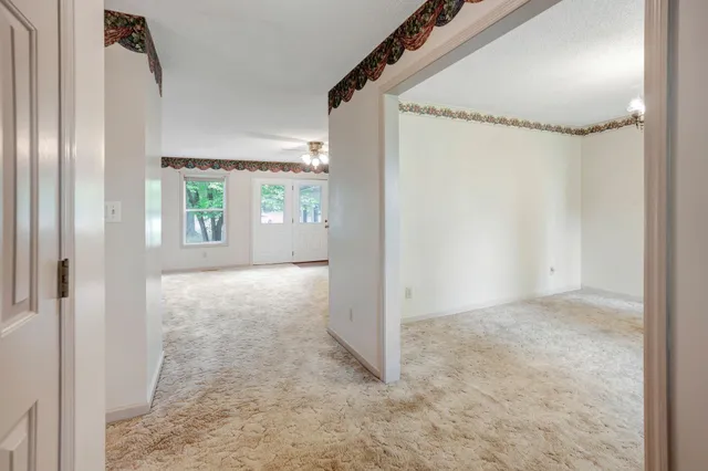 an empty room with windows