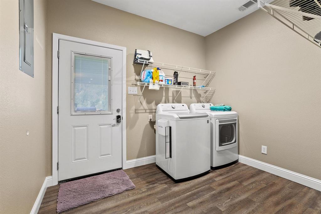 2658 Oak Ridge Road Denison, TX 75021 - Photo 26 of 37 a utility room with washer and dryer