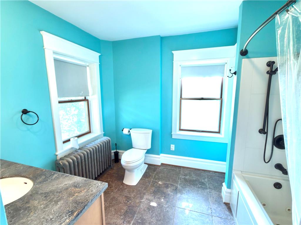 4550 Vera Cruz Road Center Valley, PA 18034 - Photo 32 of 43 Double hung windows and textured tile flooring define this bright, functional bathroom space.