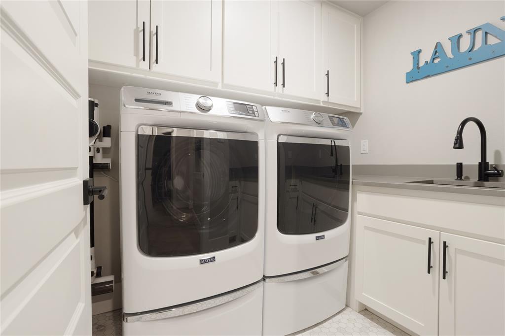 1095 Sister Grove Road Van Alstyne, TX 75495 - Photo 24 of 35 The laundry room has a sink and tons of storage.