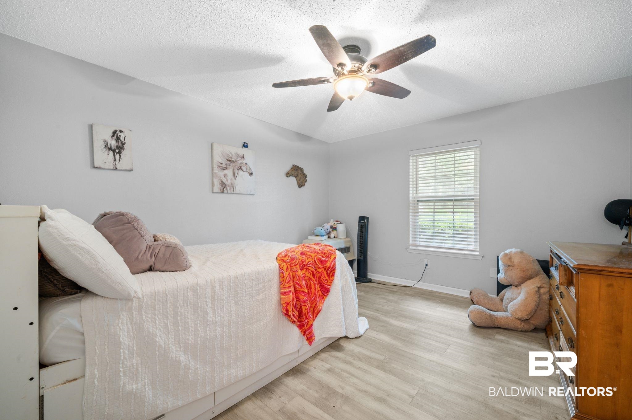 620 Southern Way Spanish Fort, AL 36527 - Photo 9 of 18 Bedroom featuring light hardwood / wood-style floors, a textured ceiling, and ceiling fan